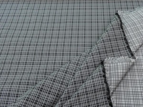 Stoff Jacquard Kunstfaser fest schwarz-weiss Gitter – Bild 2