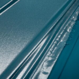 Stoff Shinyglitter petrol-silber