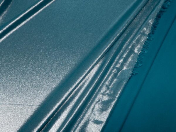 Stoff Shinyglitter petrol-silber