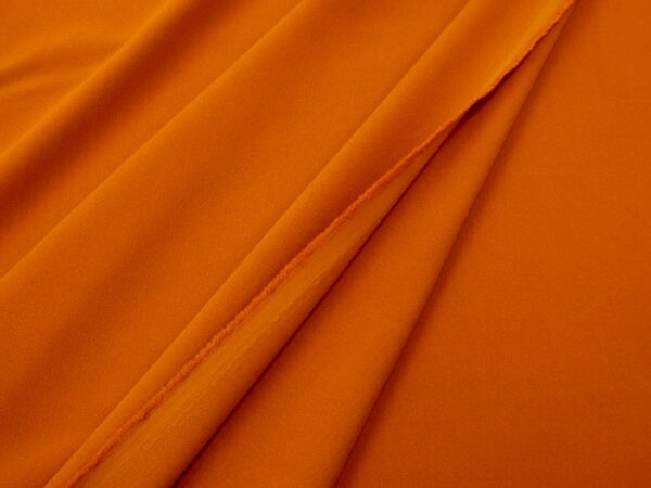 Stoff Vikrepp terracoitta/orange
